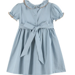 A light blue and white vertically striped baby girl's dress with short puff sleeves, a ruffled collar trimmed in gold, a button front, and a matching fabric tie belt at the waist.