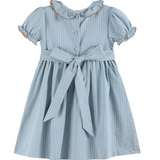 A light blue and white vertically striped baby girl's dress with short puff sleeves, a ruffled collar trimmed in gold, a button front, and a matching fabric tie belt at the waist.