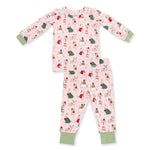 A two-piece children's pajama set laid flat on a white background. The set includes a long-sleeve top and matching pants in light pink, covered in a repeating Christmas-themed dog print.