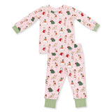 A two-piece children's pajama set laid flat on a white background. The set includes a long-sleeve top and matching pants in light pink, covered in a repeating Christmas-themed dog print.