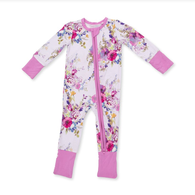 A baby long-sleeve footed sleeper with a pink floral print on a white background, featuring a pink zipper and solid pink cuffs and foot cuffs, shown on a plain white background.