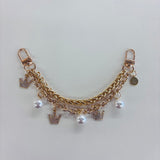 Carrying Kind Charm Pearls & Tiaras Chain