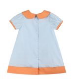 A short-sleeve baby dress in light blue with orange trim on the collar, sleeve cuffs, and bottom hem, featuring a button-up front.