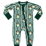 A long-sleeve baby footed sleeper with a festive pattern of dark green and white vertical stripes, accented by circular Santa Claus faces in the center of each stripe. The sleeves, cuffs, and leg cuffs are solid dark green.