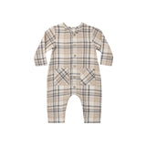 Plaid baby onesie on a white background