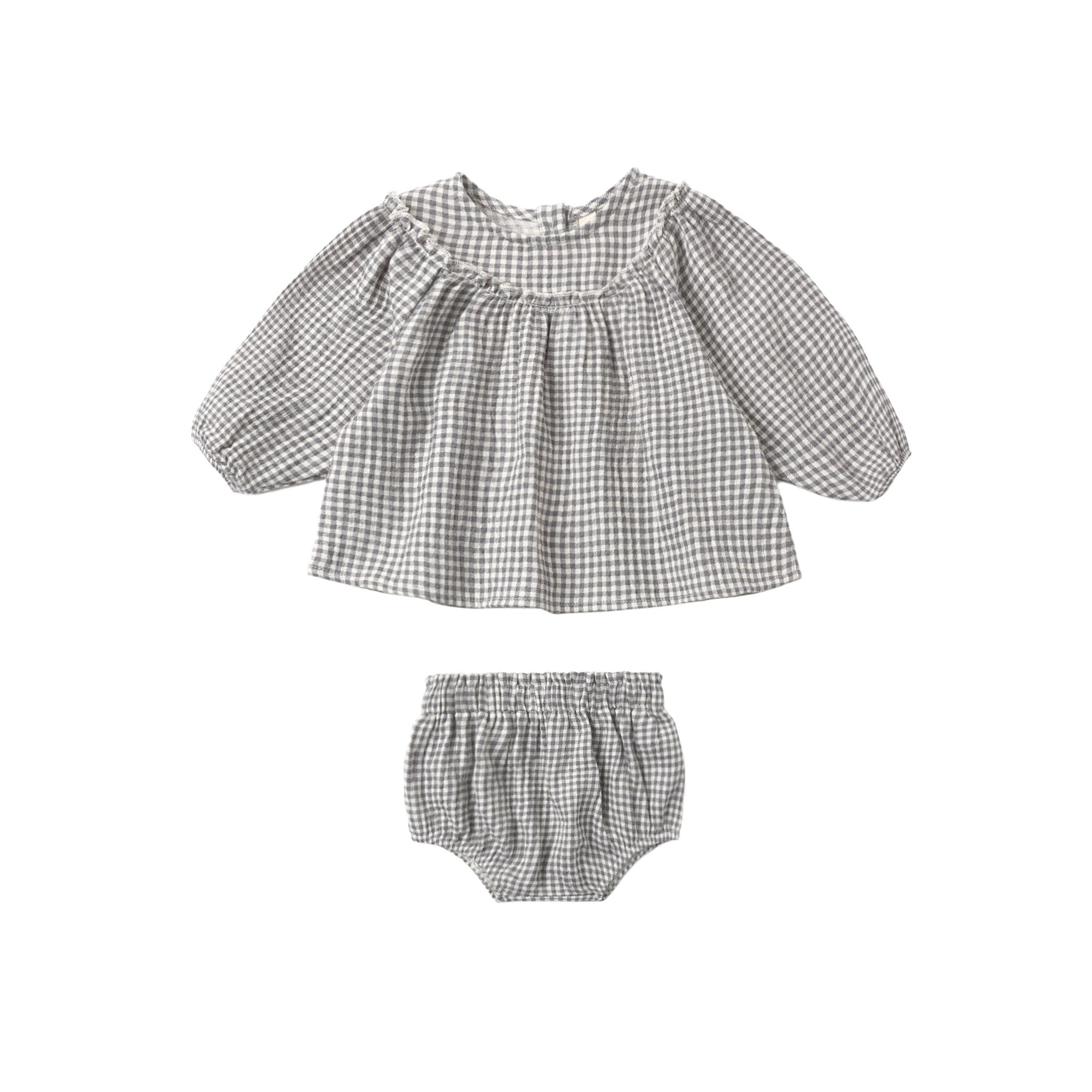 Baby outfit with checkered top and bloomers on a white background