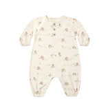 A baby long-sleeve footless romper in cream with a small brown and beige animal print, featuring a snap-button henley neckline and elastic cuffs.