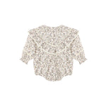 A long-sleeve baby bodysuit with a delicate beige and brown floral print, featuring a large ruffled collar and ruffle trim along the neckline and cuffs, shown flat on a white background.