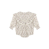 A long-sleeve baby bodysuit with a delicate beige and brown floral print, featuring a large ruffled collar and ruffle trim along the neckline and cuffs, shown flat on a white background.
