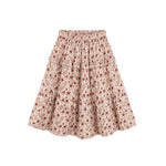 A tiered A-line skirt in a beige and brown floral print, featuring an elastic waistband, shown against a plain white background.