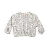 A long-sleeve crewneck sweatshirt featuring a gray and off-white leopard print pattern, displayed flat against a solid white background.