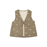 Brown vest with white floral patterns on a white background