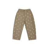 A pair of high-waisted, wide-leg cropped pants in a warm khaki-beige color, decorated with a small white daisy pattern throughout. The pants are shown flat against a solid white background.