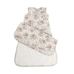 Floral-patterned baby sleeping bag on a white background