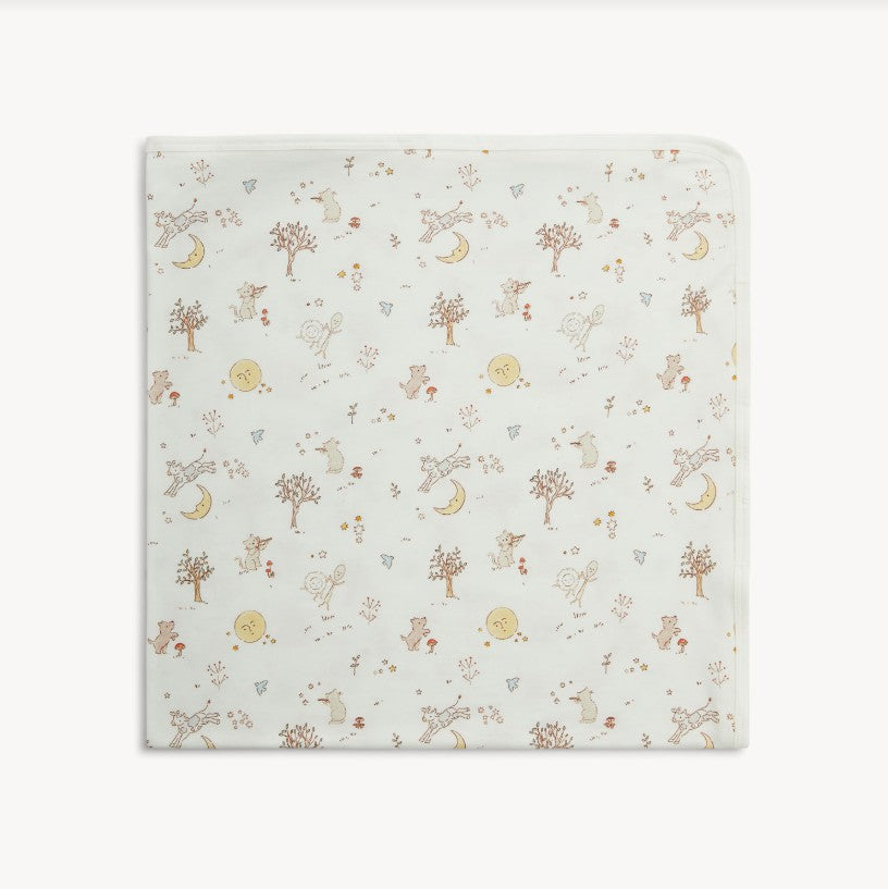 A square baby blanket with rounded corners, featuring a delicate woodland pattern of trees, squirrels, rabbits, and moons on an off-white background.