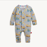 A baby long-sleeve footless one-piece romper in light gray, featuring an all-over print of yellow construction vehicles including tractors, excavators, and bulldozers. The romper has a snap closure down the front and ribbed cuffs on the sleeves and legs.