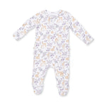 A baby footed sleeper with long sleeves and legs, featuring an all-over print of light brown deer and purple flowers on a white background.