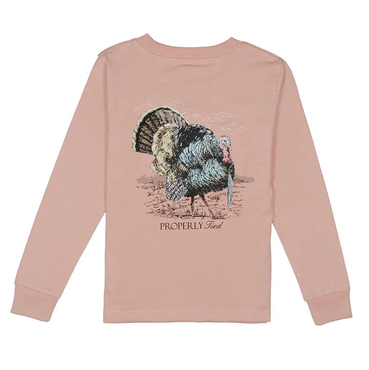 Pink long-sleeve shirt with a turkey graphic on a white background