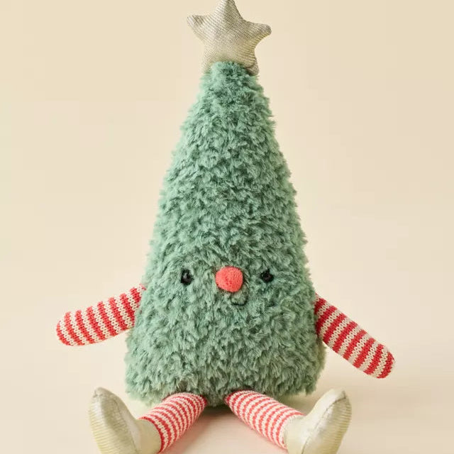 A plush Christmas tree toy with a textured mint green body, red and white striped arms and legs, a small red nose, and a gold star on top, sitting against a solid beige background.