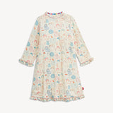 A long-sleeve baby dress with a cream base and an all-over print of cute cartoon animals in pastel blue, pink, and orange. The dress features ruffled cuffs and a ruffled hem, and is shown against a plain light background.