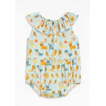 Baby romper with dog pattern on a light blue background