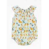Baby romper with dog pattern on a light blue background